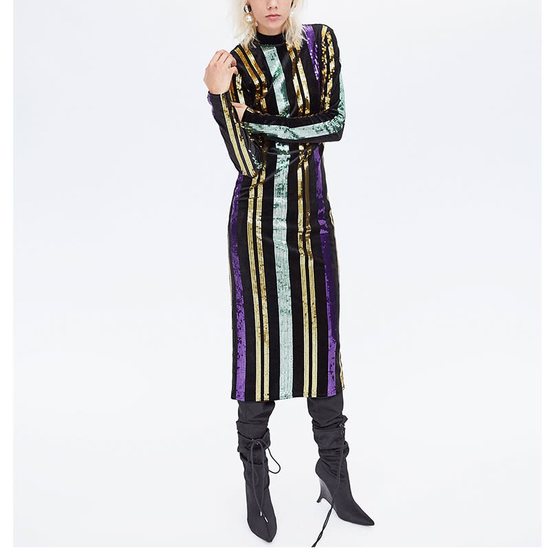 <p>Make a statement in a sequin-paneled column design to wholeheartedly embrace the festive mood. Style with slouchy boots for a fashion-girl effect.</p> <p><a rel="nofollow noopener" href="https://www.zara.com/us/en/striped-sequinned-dress-p03184287.html?v1=5217504&v2=867001" target="_blank" data-ylk="slk:Zara Striped Sequined Dress;elm:context_link;itc:0;sec:content-canvas" class="link ">Zara Striped Sequined Dress</a>, $50</p>