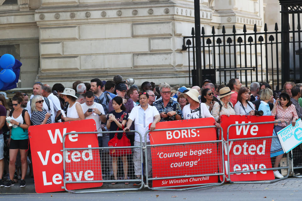 Protesters outside 10 Downing Street, London, awaiting the arrival of new Prime Minister Boris Johnson.