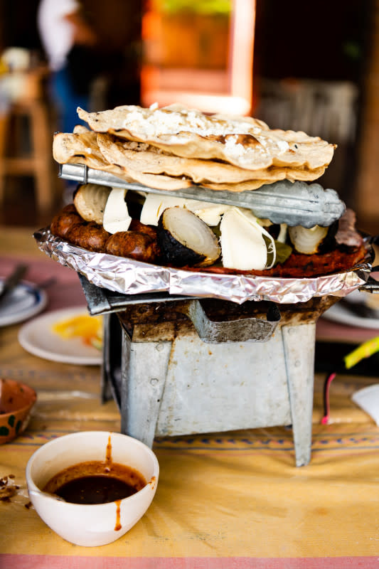 <p>Photo: Bruno Long</p><p> Stacked layers of meat, vegetable and bread will fuel your afternoon riding adventure.</p>