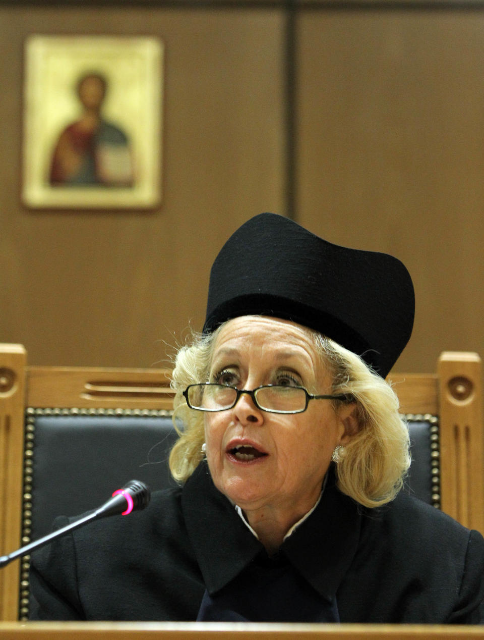 The head of Greece's Association of Judges and Public Prosecutors, Vassiliki Thanou delivers a speech during a protest of judicial officials at country's Supreme Court building in Athens, Monday, Sept. 17, 2012. In the most serious confrontation between unions and the Greek coalition government since it was formed three months ago, the country's judges and hospital doctors on Monday began what they intend to be lengthy protests against planned austerity measures. (AP Photo/Thanassis Stavrakis)
