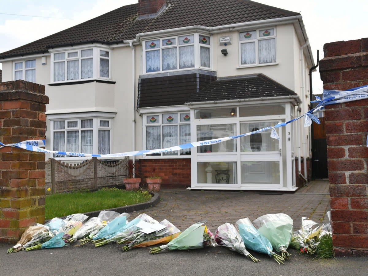 Flowers were laid at the scene where Ms Downer died (PA)