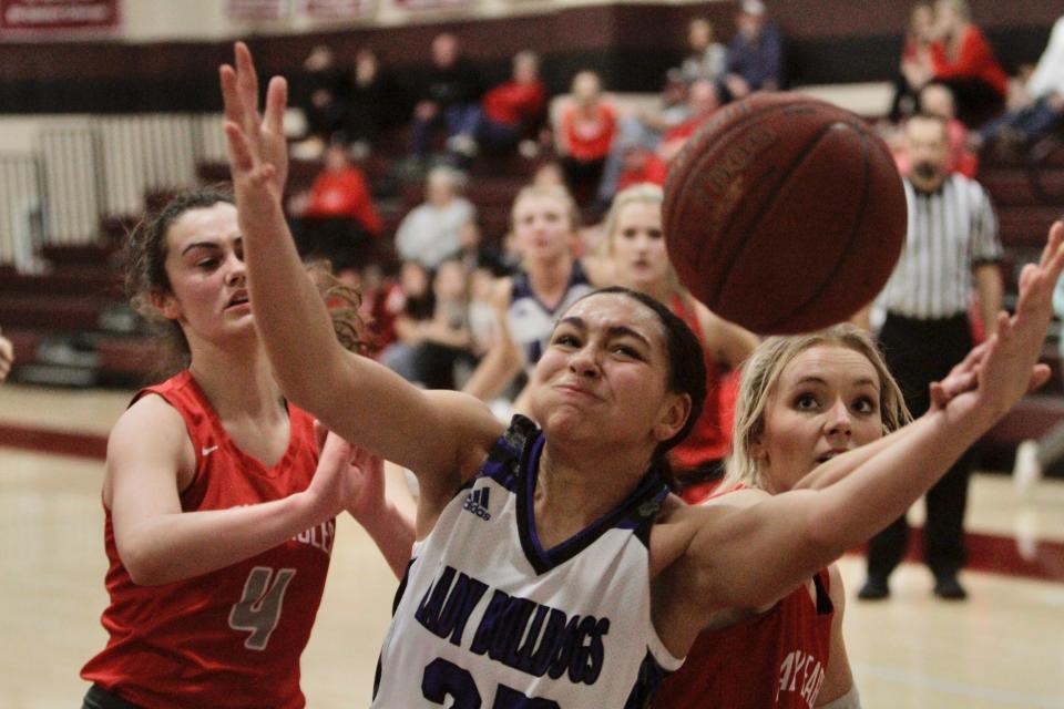 Stamford junior Laylonna Applin secures a rebound against Holliday on Wednesday, Dec. 29.