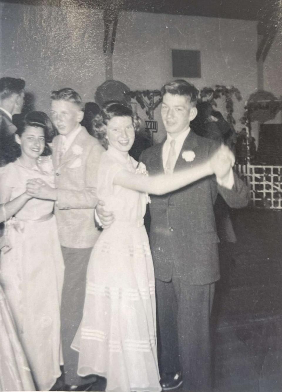 PHOTO: Mary Grace Tassone and Elsie Webb are pictured at their high school’s prom in 1952. (Courtesy Atria Senior Living)