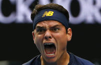 Canada's Milos Raonic reacts after winning his fourth round match against Switzerland's Stan Wawrinka at the Australian Open tennis tournament at Melbourne Park, Australia, January 25, 2016. REUTERS/Thomas Peter