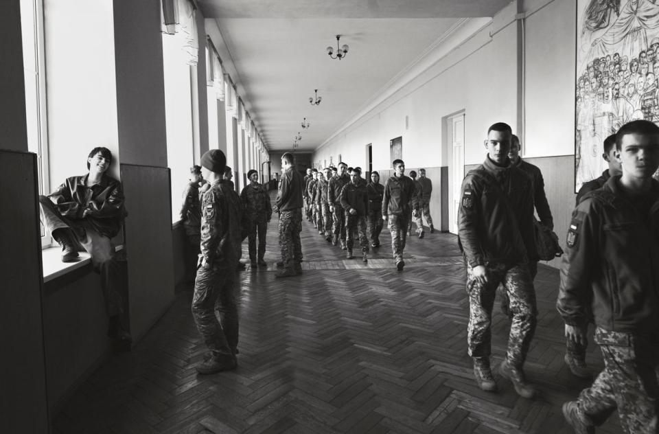 Cadets of the Ivan Bohun Kyiv Military Lyceum in Kyiv, Ukraine, 2024. This series of photographs shows teenagers aged 16-17, students of the most prestigious specialized educational institution in the country. For the author, these young people are the embodiment of Ukraine's future, the nation's salt of the earth: They study, communicate, and joke like ordinary schoolchildren, but they have consciously chosen a military career and are preparing to defend their homeland. (Brett Lloyd/Vogue Ukraine)