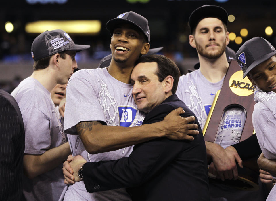 FILE - Duke head coach Mike Krzyzewski and guard Lance Thomas embrace after Duke's 61-59 win over Butler in the men's NCAA college basketball Final Four championship game in Indianapolis, April 5, 2010. (AP Photo/Michael Conroy, File)