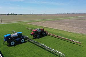 CNH Industrial brands Case IH (right) and New Holland (left) sprayers equipped with One Smart Spray technology