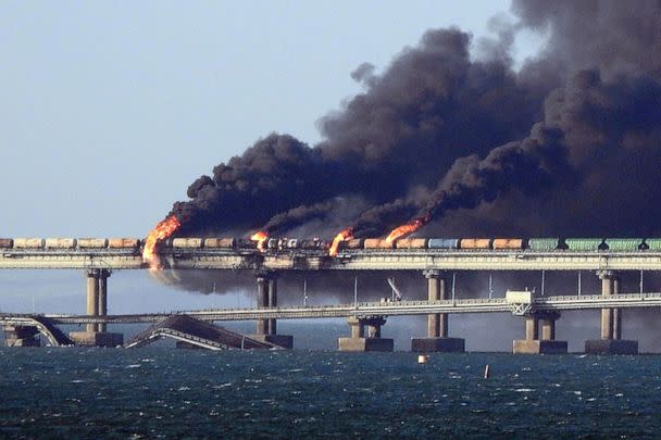 PHOTO: Black smoke billows from a fire on the Kerch bridge that links Crimea to Russia, after a truck exploded, near Kerch, Oct. 8, 2022.  (-/AFP via Getty Images)