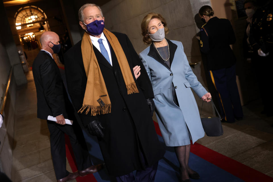 <p>Former President George W. Bush and Laura Bush arrive to the inauguration on Wednesday. </p>