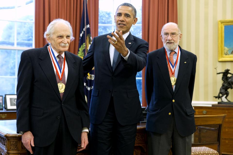 President Barack Obama meets with recipients of the 2013 Fermi Award, scientists Allen Bard, left and Andrew Sessler, in the Oval Office of the White House in Washington, Monday, Feb. 3, 2014. (AP Photo/Jacquelyn Martin)