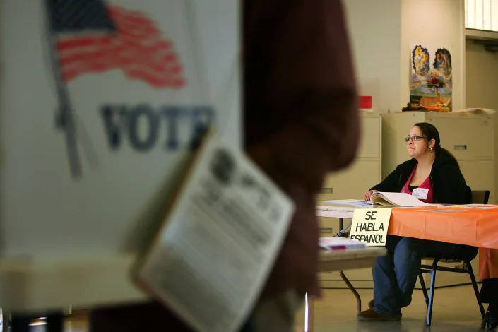 A bilingual election official