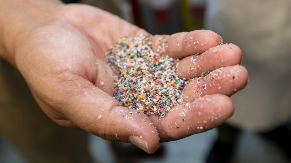 Plastic waste that has been shredded before being chemically treated to purify compounds.