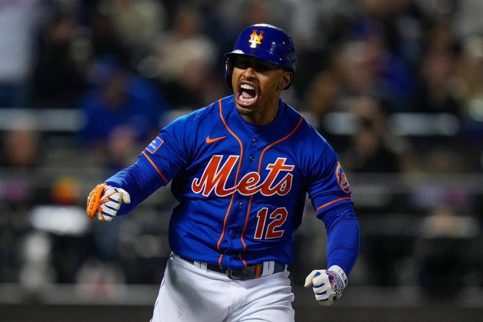 New York Mets' Francisco Lindor celebrates after hitting his 30th home run of the season, during the fourth inning against the Miami Marlins in the second baseball game of a doubleheader Wednesday, Sept. 27, 2023, in New York.