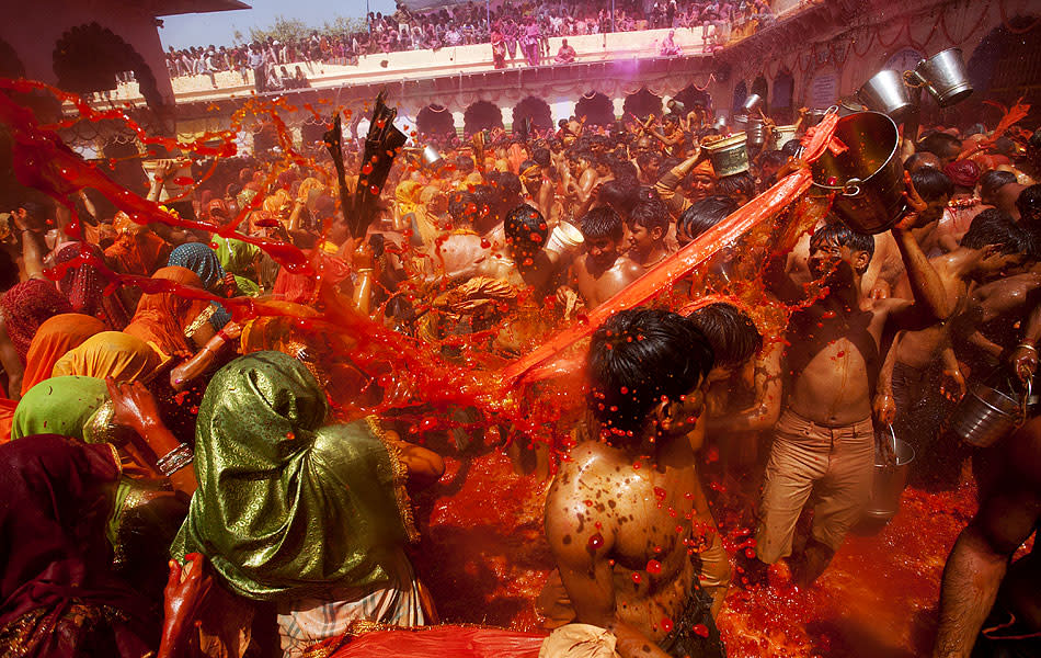 Riotous Holi celebrations in Daauji ka Huranga, Uttar Pradesh, India.<br><br> <p>Travel photojournalist JITENDRA SINGH lives and works in Shimla, Himachal Pradesh and is deeply interested is music, the visual arts and literature. His work has been used by Getty Images, National Geographic Traveler, Outlook Traveller, and government departments such as the Ministry of External Affairs, Ministry of Culture. <a href="http://www.flickr.com/photos/jitens/" rel="nofollow noopener" target="_blank" data-ylk="slk:Enjoy more of his work on Flickr;elm:context_link;itc:0;sec:content-canvas" class="link ">Enjoy more of his work on Flickr</a></p>