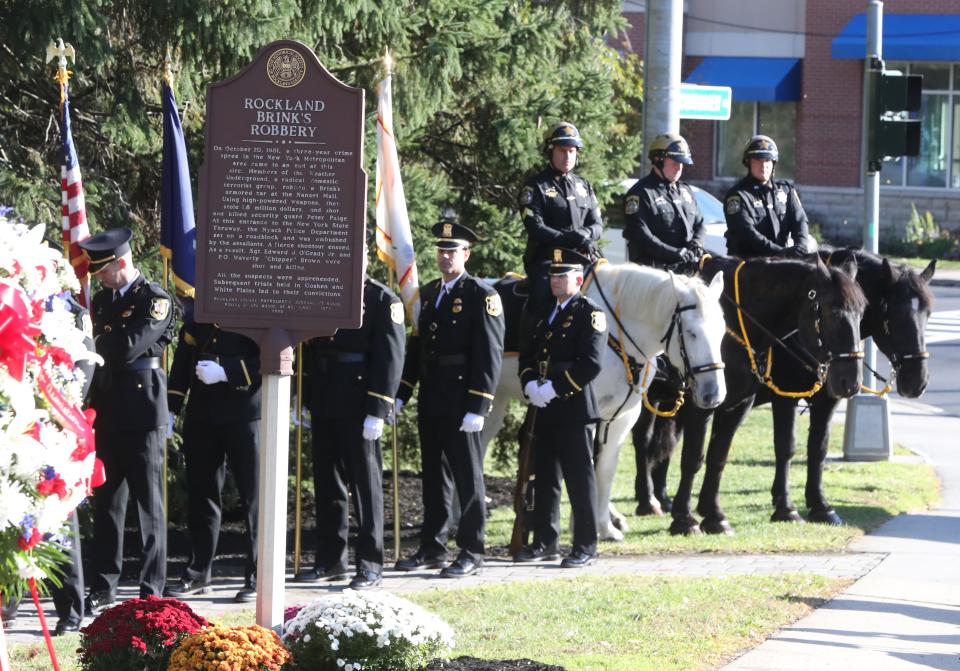 The honor guard carries in the flag to start annual Brinks memorial ceremony at Mountainview Ave. in Nyack Oct. 20, 2022. The ceremony honored Nyack police officer Waverly "Chipper" Brown, Sgt. Edward O'Grady, Jr. and Brinks guard Peter Paige who were murdered in the Brinks armored car robbery 41 years ago.