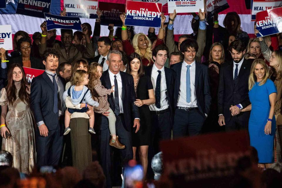 JOSEPH PREZIOSO/AFP via Getty  Robert F. Kennedy Jr. with members of his family in 2023.