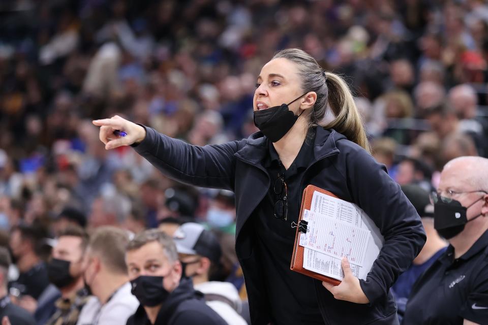 San Antonio Spurs assistant coach Becky Hammon gives instructions during a game against the Utah Jazz.