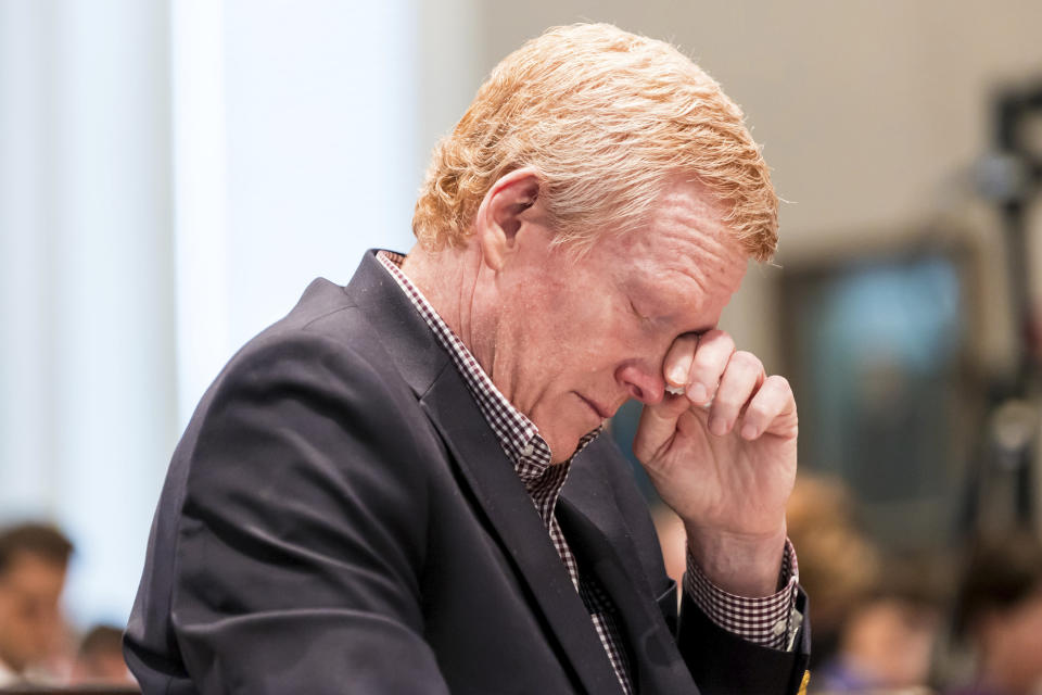 Alex Murdaugh cries while listening to his son Buster Murdaugh testify during Alex Murdaugh's trial at the Colleton County Courthouse in Walterboro, S.C., on Tuesday, Feb. 21, 2023. The 54-year-old attorney is standing trial on two counts of murder in the shootings of his wife and son at their Colleton County, S.C., home and hunting lodge on June 7, 2021. (Jeff Blake/The State via AP, Pool)