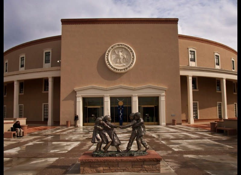 <strong>NEW MEXICO STATE CAPITOL</strong>  Santa Fe, New Mexico    <strong>Year completed:</strong> 1966  <strong>Architectural style:</strong> New Mexico Territorial/Greek Revival  <strong>FYI:</strong> New Mexico’s Capitol is the only one housed in a completely round building, earning it the nickname “The Roundhouse.” When seen from above, the shape is meant to evoke the Zia sun symbol.  <strong>Visit:</strong> Tour the capital on your own Monday through Friday, 7 a.m. to 6 p.m. Guided tours are available by appointment.  