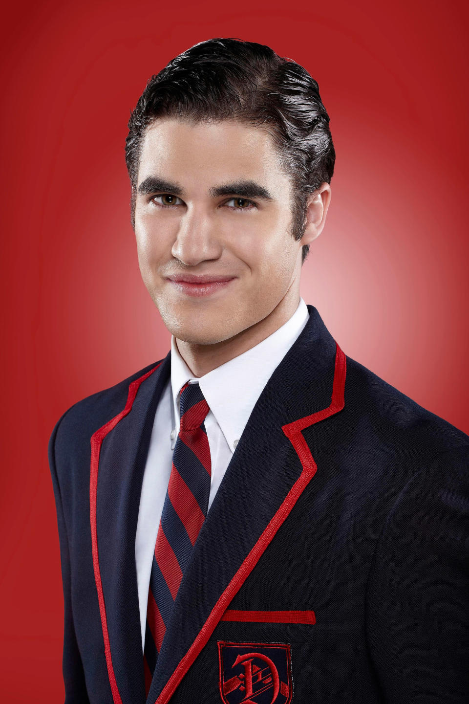 Darren Criss as Blaine smiles in a promotional photo for "Glee"