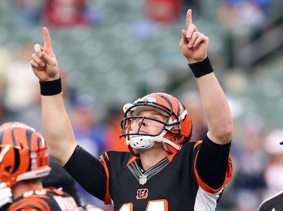 CINCINNATI, OH - NOVEMBER 11: Andy Dalton #14 of the Cincinnati Bengals celebrates following 31-13 win in the NFL game against the New York Giants at Paul Brown Stadium on November 11, 2012 in Cincinnati, Ohio. (Photo by Andy Lyons/Getty Images)