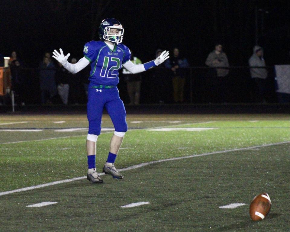 Blue Hills punt returner Aidan Landers calls a fair catch on a punt during the annual Thanksgiving game against Bristol-Plymouth.