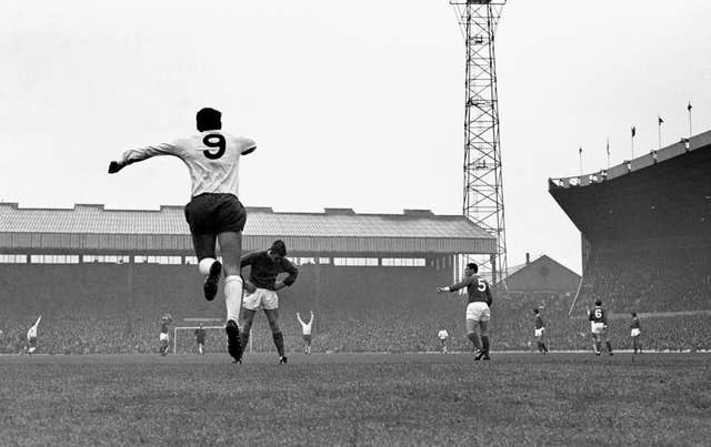 Alan Gilzean of Tottenham celebrates and Manchester United goalkeeper Alex Stepney looks dejected after Spurs goalkeeper Pat Jennings scored in the Charity Shield match at Old Trafford, Manchester. The match ended 3-3