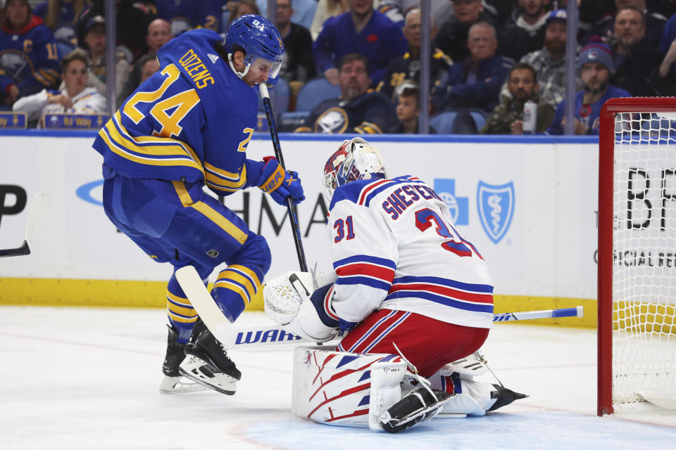 Buffalo Sabres center Dylan Cozens (24) is stopped by New York Rangers goaltender Igor Shesterkin (31) during the first period of an NHL hockey game Thursday, Oct, 12, 2023, in Buffalo, N.Y. (AP Photo/Jeffrey T. Barnes)