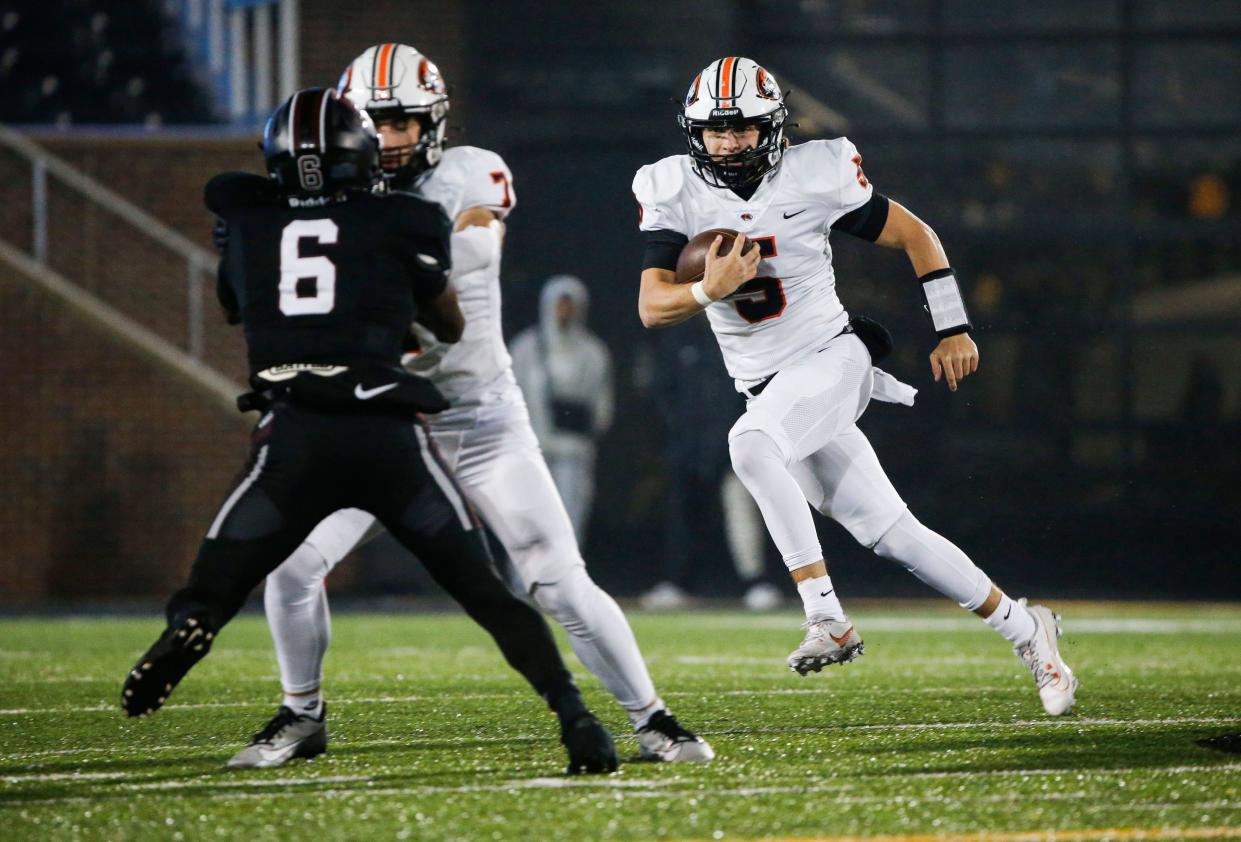 Republic's Wyatt Woods (5) carries the ball as they take on the Cardinal Ritter Lions in the Class 5 State Championship football game at Faurot Field in Columbia, Mo. on Friday, Dec. 1, 2023.