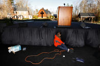 <p>A worker prepares the stage near the Billy Graham Library before the start of the funeral for evangelist Billy Graham in Charlotte, N.C., March 2, 2018. (Photo: Jonathan Drake/Reuters) </p>