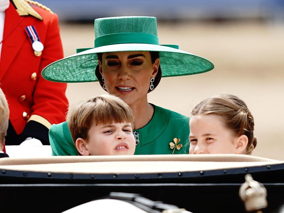 Kate Middleton, Prince Louis and Princess Charlotte during the Trooping the Colour