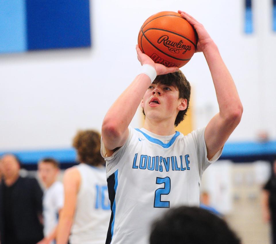 Louisville's Brayden Gross shoots a foul shot against Hoban, Friday, Dec. 15, 2023.