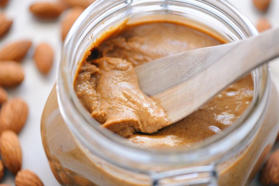 <p>The Californian almond industry has been linked to the deaths of billions of bees. That’s not the only reason to switch back to PB: the two nut butters have comparable levels of <a href="https://www.menshealth.com/uk/nutrition/a759066/the-benefits-of-vitamin-b/" rel="nofollow noopener" target="_blank" data-ylk="slk:B vitamins;elm:context_link;itc:0;sec:content-canvas" class="link ">B vitamins</a> and minerals, but peanut contains 5g of protein per spoonful, compared to almond’s 3g.</p>
