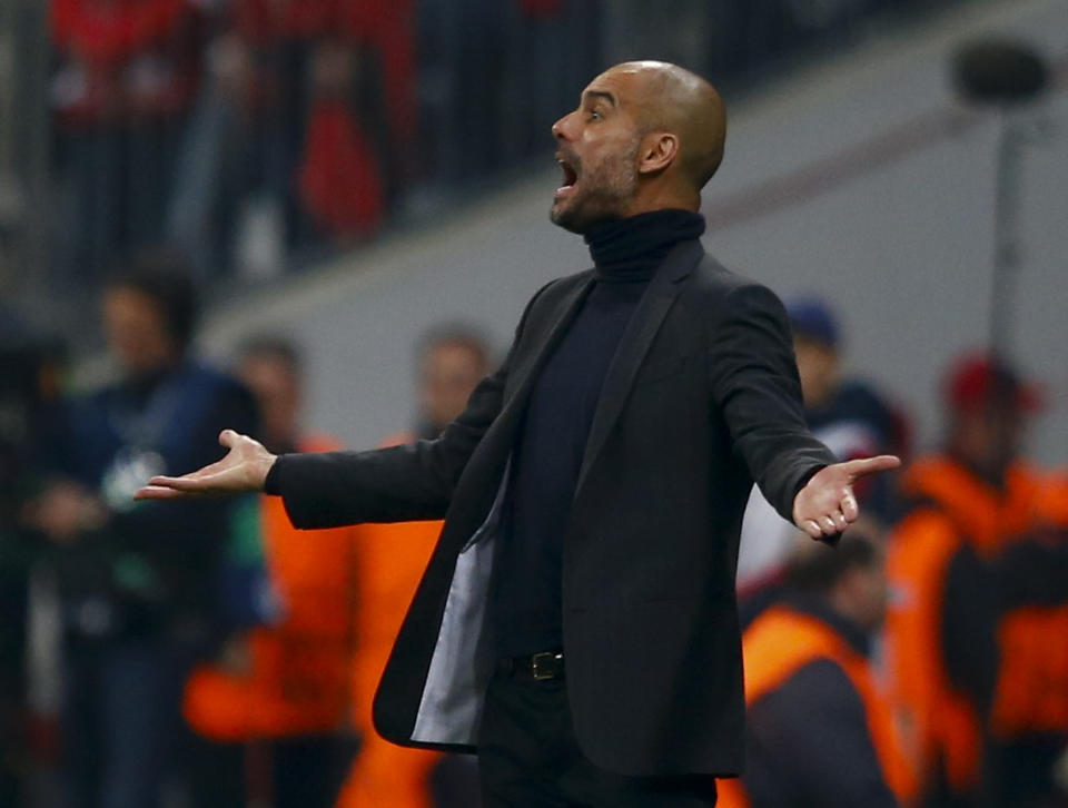 Bayern Munich's coach Guardiola reacts during their Champions League semi-final second leg soccer match against Real Madrid in Munich