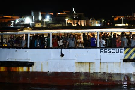 Spanish rescue ship Open Arms with migrants on board arrives in Lampedusa