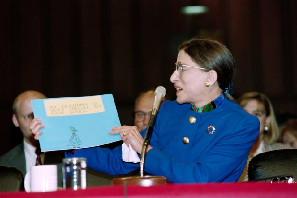 <div class="inline-image__caption"><p>Ruth Bader Ginsburg holds up her grandson Paul Spera's book, titled "My Grandma Is Very Special," during her Senate confirmation hearings in 1993.</p></div> <div class="inline-image__credit">JENNIFER LAW</div>