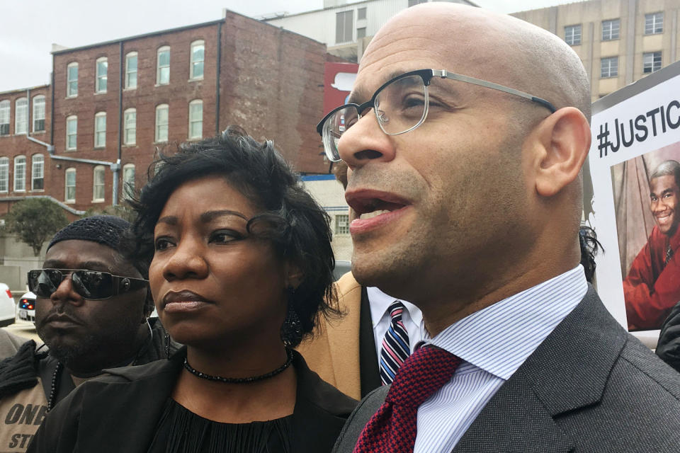 Monteria Robinson, Jamarion Robinson's mother, with her lawyer, Andrew M. Stroth, outside the federal courthouse in Atlanta in 2018. (Kate Brumback / AP)