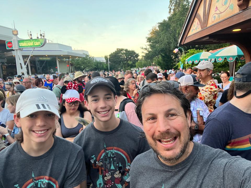 Ash Jurberg and his sons at the front of the line before the park opens.