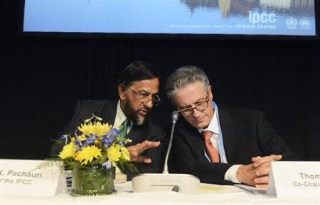 Intergovernmental Panel on Climate Change (IPCC) Chairman Rajendra Pachauri (L) and Co-chairman Thomas Stocker present the U.N. IPCC Climate Report during a news conference in Stockholm, September 27, 2013. REUTERS/Bertil Enevag Ericson/TT News Agency