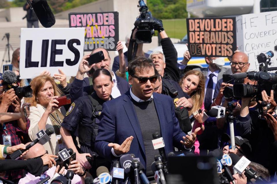 U.S. Rep. George Santos leaves the federal courthouse in Central Islip, N.Y., Wednesday, May 10, 2023. (AP Photo/Seth Wenig)