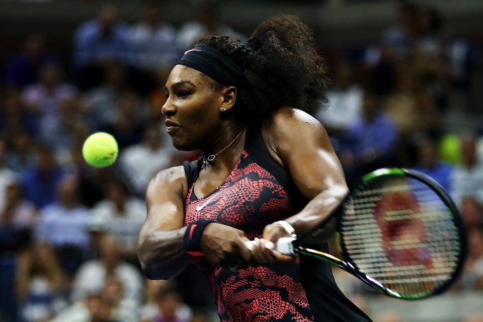 NEW YORK, NY - SEPTEMBER 08:  Serena Williams of the United States returns a shot to Venus Williams of the United States during their Women's Singles Quarterfinals match on Day Nine of the 2015 US Open at the USTA Billie Jean King National Tennis Center on September 8, 2015 in the Flushing neighborhood of the Queens borough of New York City.  (Photo by Matthew Stockman/Getty Images)