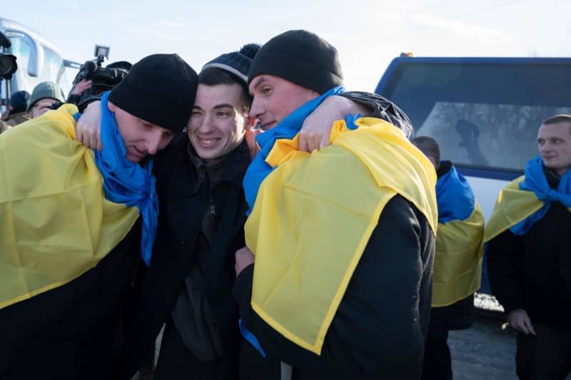 Ukrainian soldiers arrive back home following a prisoner of war (POW) exchange between Russia and Ukraine. The exchange was the 50th return of prisoners of war and involved 207 Ukrainian defenders. Pool/Ukrainian Presidentia/Planet Pix via ZUMA Press Wire/dpa