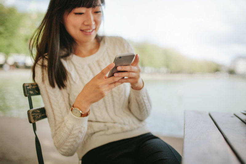 Lady Holding Mobile Phone