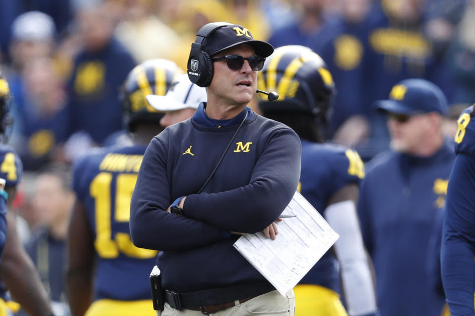 FILE - In this Saturday, Oct. 5, 2019, file photo, Michigan head coach Jim Harbaugh watches during the second half of an NCAA college football game against Iowa in Ann Arbor, Mich. Harbaugh sent an email to parents of players on his team, refuting a report saying representatives are working on his departure from the school. (AP Photo/Paul Sancya, File)