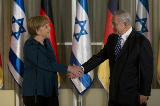 Germany's Chancellor Angela Merkel, left, shakes hands with Israeli Prime Minister Benjamin Netanyahu during their meeting at the Prime minister's residence in Jerusalem, Monday, Feb. 24, 2014. (AP Photo/Sebastian Scheiner)