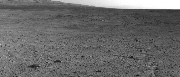 NASA's Mars rover Curiosity captured this view using its Navigation Camera (Navcam) after reaching the top of a rise called "Panorama Point" with a drive during the 388th Martian day, or sol, of the rover's work on Mars (Sept. 8, 2013).