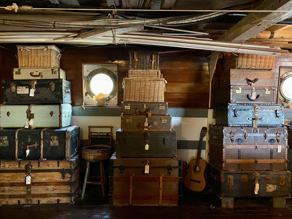 Suitcases on the cargo deck used for storage.