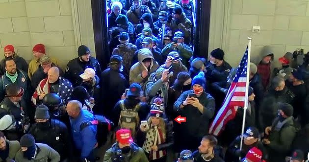 Jenna Ryan (center) enters the Capitol with the mob. (Photo: U.S. Attorney's Office)