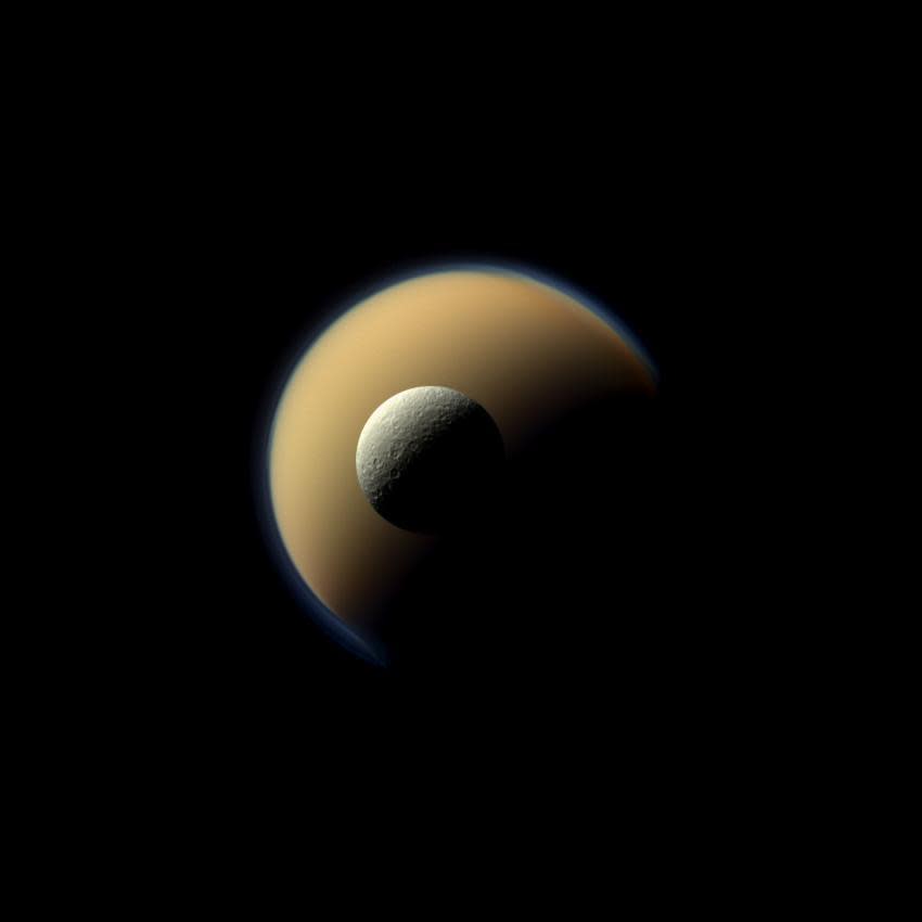 Here Cassini captures Saturn's largest and second largest moons, Titan and Rhea, from over 1 million kilometers away in a true-color image on June 16, 2011.