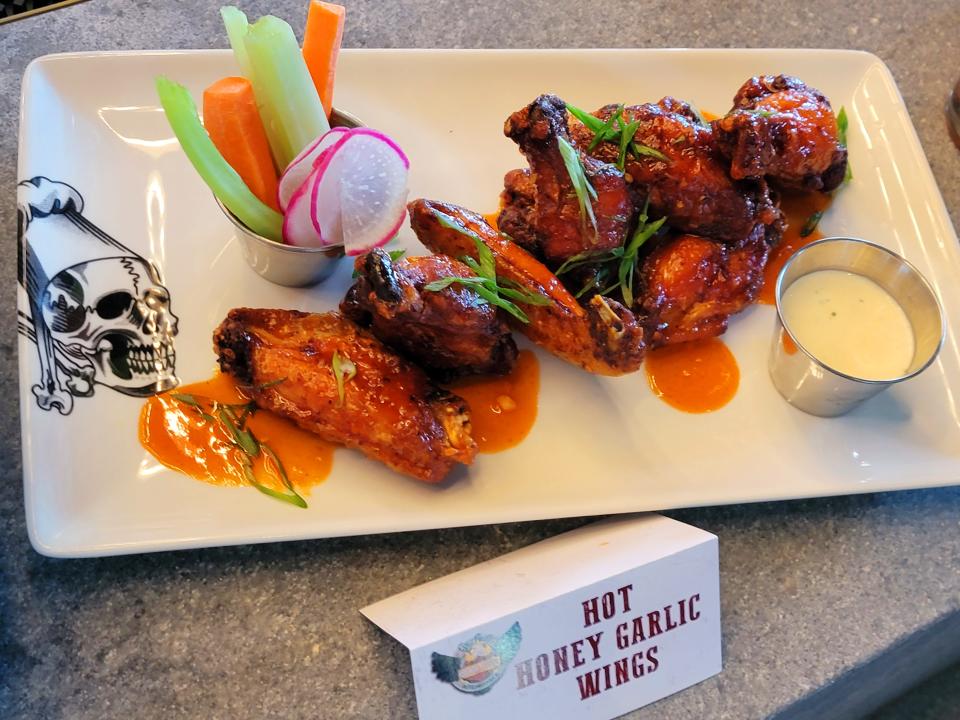Many dishes on the Guy Fieri's Kitchen + Bar menu in Council Bluffs can be found at other Fieri restaurants, but the hot honey garlic wings are available only at the Iowa restaurant.